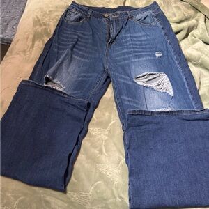 Distressed wide legged jeans